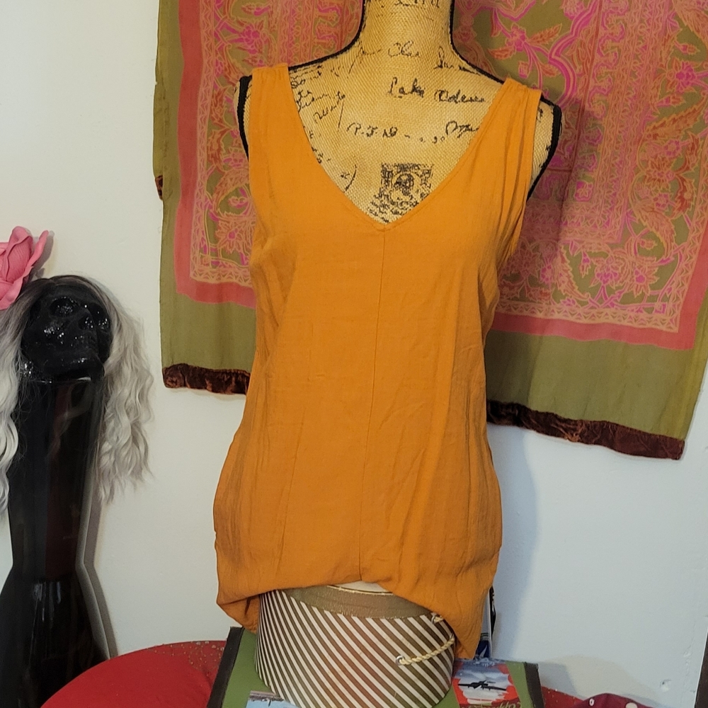 Orange romper with pockets
